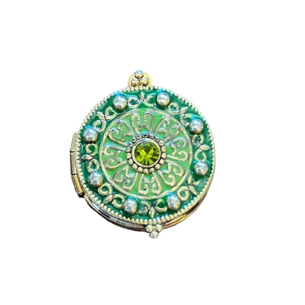 Locket no chain design with rhinestone in center.  #12-27